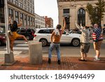 Small photo of PORTLAND, MAINE, USA - 07 NOVEMBER, 2020: Mainers celebrate Joe Biden's victory of the 2020 United States presidential election in downtown Portland Maine.