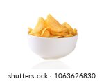 Potato chips, crisps in the bowl in the white background, isolated