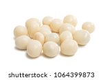 nuts in white chocolate isolated on white background