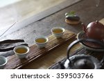 Chinese Tea Set On Old Wooden...