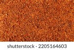 Small photo of Seasoning preparation, mild hot powder mixture, with spices and tomatoes, (black pepper, garlic, cane sugar, granulated tomatoes, cayenne pepper, sea salt) background and texture