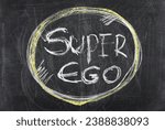 Small photo of Concept psychology superego on black chalkboard, blackboard texture
