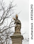 Small photo of Virgin Mary and Baby Jesus statue in Herbert C. Hoover park, Warsaw, Poland. It was founded and constructed by Jozef Bellotti in 1683.