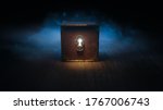 mysterious box with keyhole on a dark background. (3D Rendering, illustration)