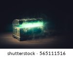 Small photo of open pandora's box with green smoke on a wooden background /high contrast image