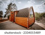 Brown igloo sauna during sunny summer weather