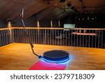 Defocused view of a 360 photo booth used at an event