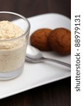 Small photo of syllabub on a plate with cookies