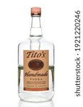 Small photo of IRVINE, CALIFORNIA - JUNE 28, 2019: A 1.75 liter bottle of Titos Handmade Vodka, crafted in an Old Fashioned Pot Still in Austin, Texas.