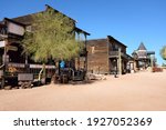 Small photo of APACHE JUNCTION, ARIZONA - DECEMBER 8, 2016: Shops and looking up the street towards Lu Lu's Bordello at the Goldfield Ghost Town, in Apache Junction, Arizona, off of Route 88.