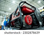 Small photo of Portable diesel generator AC at the showroom of a large store.