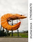 Small photo of Ballina, Australia - July 2020: Big Prawn, one of the iconic "giant things" dotted around Australia. The prawn had a makeover in 2013 to add the tail