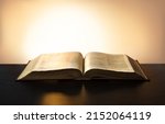 Small photo of Grunge age dirty rough rustic brown jew psalm pray torah law letter shine dark black wooden desk table space. New jew culture god Jesus Christ gospel literary library glow art wood still life concept