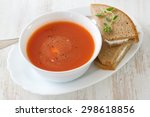 Tomato Soup In White Bowl With...