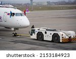 Small photo of Almaty, Kazakhstan - 03.16.2022 : The plane of the Mongolian airline Hunnu Air is parked at the airport site.