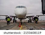 Small photo of Almaty, Kazakhstan - 03.16.2022 : The plane of the Mongolian airline Hunnu Air is parked at the airport site.