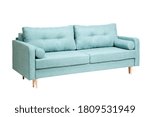 Turquoise sofa with two pillows and two bolsters on a white background isolated