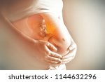 Pregnant Woman's Belly Closeup...
