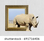 Rhino in old wooden frame with...