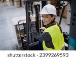 Small photo of Female warehouse worker driving forklift. Warehouse worker preparing products for shipmennt, delivery, checking stock in warehouse.