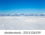 Small photo of Lake Baikal in winter, the deepest and largest freshwater lake by volume in the world, located in southern Siberia, Russia