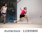 Small photo of BUKIT JALIL, MALAYSIA - SEPTEMBER 12: Low Wee Wern (white) defeats Madeline Perry at the CIMB Malaysian Open Squash Championship 2012 on September 12, 2012 at the National Squash Centre, Malaysia.