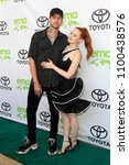 Small photo of LOS ANGELES - MAY 22: Travis Mills, Madelaine Petsch at the 28th Annual Environmental Media Awards at the Montage Beverly Hills on May 22, 2018 in Beverly Hills, CA