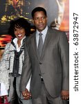 Small photo of LOS ANGELES - OCT 26: Pauletta & Denzel Washington arrive at the "Unstoppable" Premiere at Regency Village Theater on October 26, 2010 in Westwood, CA