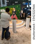 Small photo of New York, NY, USA - October 25th, 2019: Model poses for photographers at PDN PhotoPlus 2019 conference and expo at Javits Convention Center, Manhattan