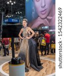 Small photo of New York, NY, USA - October 25th, 2019: Model poses for photographers at PDN PhotoPlus 2019 conference and expo at Javits Convention Center, Manhattan