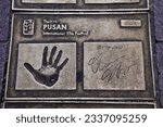 Small photo of BUSAN, SOUTH KOREA - MARCH 27, 2023: Director Oliver Stone hand print commemorating Busan International Film Festival on BIFF Square in downtown Busan, South Korea.