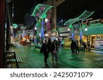 Small photo of BUSAN, SOUTH KOREA - MARCH 28, 2023: People visit BIFF Square by night in downtown Busan, South Korea.