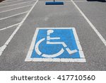 Handicapped parking spot - transportation infrastructure road markings.