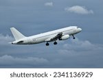 Small photo of Riga, Latvia - July 22, 2023: Avion Express Airbus A320-232 9H-AMI takes off from RIX International Airport.