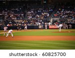 Small photo of NEW YORK - SEPTEMBER 7: Yankees pitcher C.C. Sabathia delivers the ball to Orioles first baseman Ty Wiggington in a game at Yankee Stadium September 7, 2010 in New York, NY