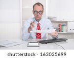 Small photo of Warning manager or businessman - unsympathetic boss giving a cancellation