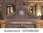 Small photo of Istanbul, Turkey - October 17, 2023: Public Clock With Sign Cite de Pera at Flower Passage Wall Istiklal Street in City Cetnre Night.