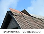 Damaged Slate Roof Piece On A...