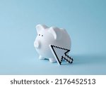 Piggy piggy bank on pastel blue background and pixel mouse cursor. Minimal trend creative concept of income and savings online or remote work from home.