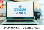 Small photo of POZNAN, POL - NOV 20, 2021: Laptop displaying logo of The Sustainable Development Goals, a collection of 17 interlinked global goals set up in 2015 by the United Nations General Assembly
