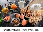 Small photo of Composition with common food allergens including egg, milk, soya, nuts, fish, seafood, wheat flour, mustard, dried apricots and celery