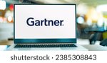 Small photo of POZNAN, POL - FEB 25, 2022: Laptop computer displaying logo of Gartner, a technological research and consulting firm based in Stamford, Connecticut, USA