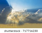 Sunset sky with cloud and sun ray. Nature background. Miracle, hope, or amazing nature concept.