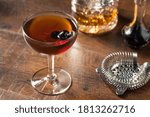 Refreshing Boozy Manhattan Cocktail with Vermouth and Cherry Garnish