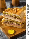 Small photo of Hearty Homemade Cubano Pork Sandwich with Ham Cheese and Mustard