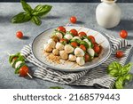 Small photo of Homemade Fresh Caprese Skewer Appetizer with Tomato Basil and Mozarella