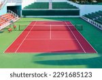 Small photo of Tennis court. View of a tennis court with artificial turf