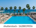 Small photo of Protaras, Cyprus - Oct 12. 2019. outdoor swimming pool in Constantinos The Great Beach Hotel.
