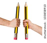 Small photo of Hands holding long pencils with erasure isolated on white background