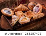 Selection of French & Danish pastries on a Wicker basket 